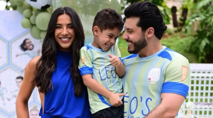 Gabriela Versiani exibe look dela e de Léo, filho de Murilo Huff para gravação do cantor